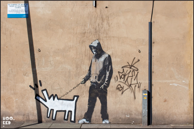 Banksy Hoodie Stencil Walking dog in South London.